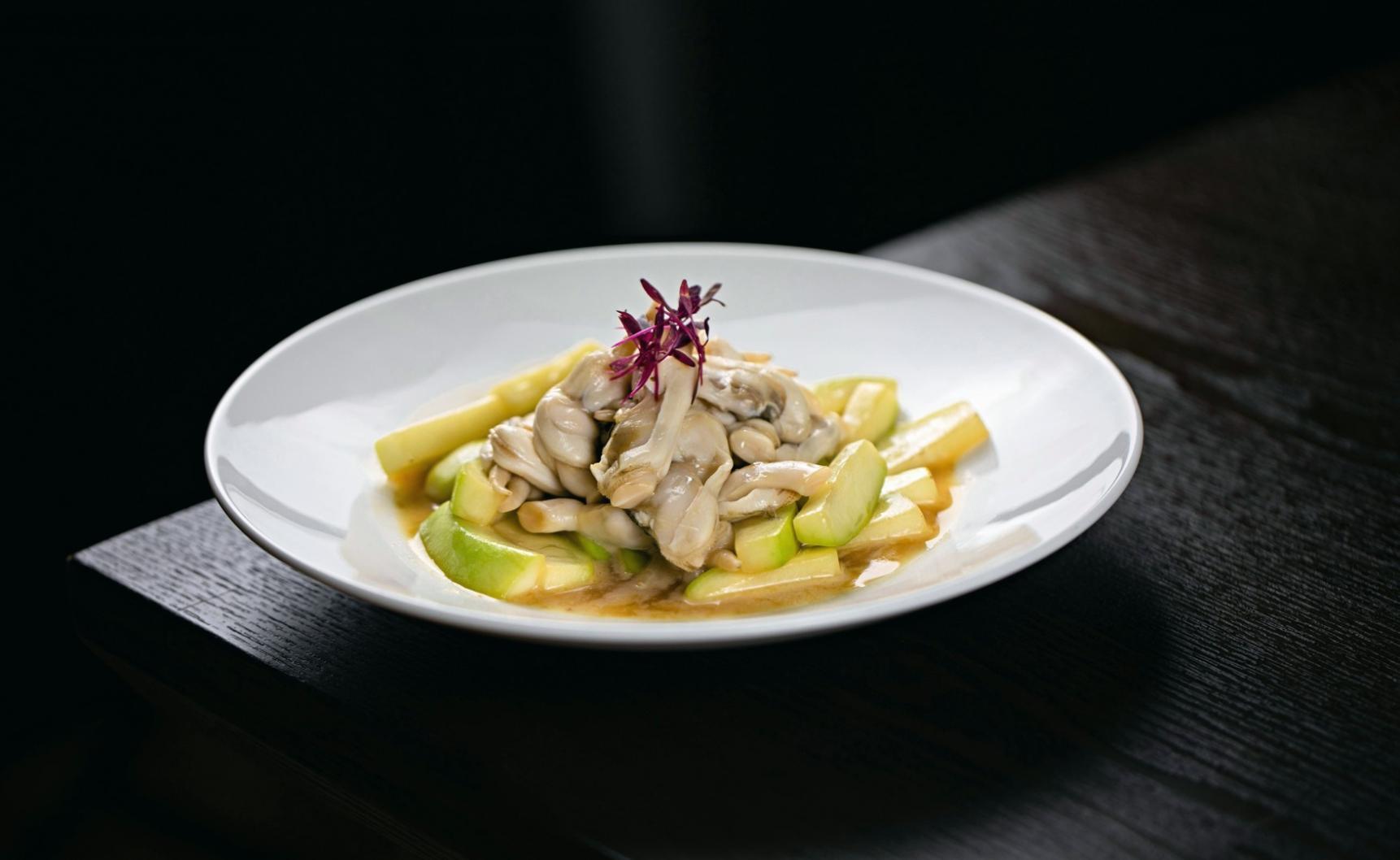 Chef hands working with dough demonstrating precise technique